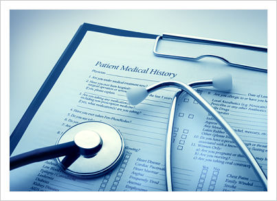 Patient Medical History form on a clipboard and a stethoscope on top of it